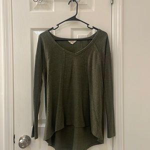 Green top, long sleeve, longer in back